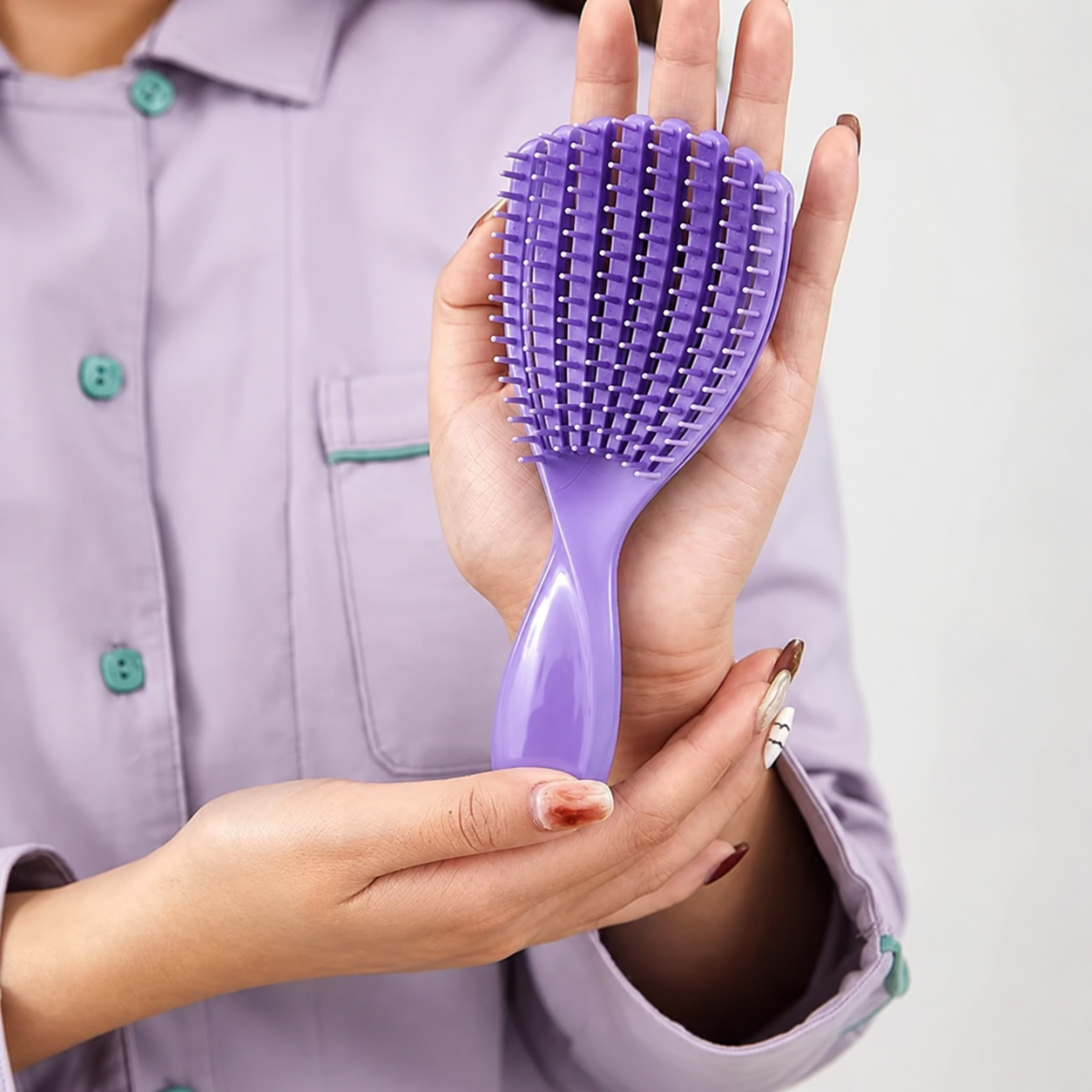 Mini cepillo desenredante flexible para cabello