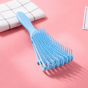 Cepillo desenredante flexible para cabello