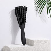 Cepillo desenredante flexible para cabello