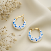 Aretes blancos con detalles azules - Dressygt
