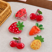 Docena de ganchos para cabello con diseño de frutas