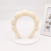 Docena de diademas Skincare