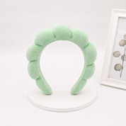Docena de diademas Skincare