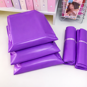 Ciento de bolsas para empaque de 44x61cm - 0.13mm color fucsia - Dressygt