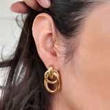 Aretes colgantes de círculo doble