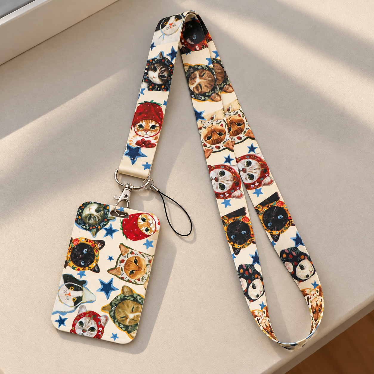Cordondegatosyestrellassobremesacalida.png