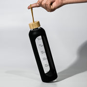 Botella de agua de vidrio