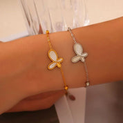 Pulsera dorada con dije de mariposa - Dressygt
