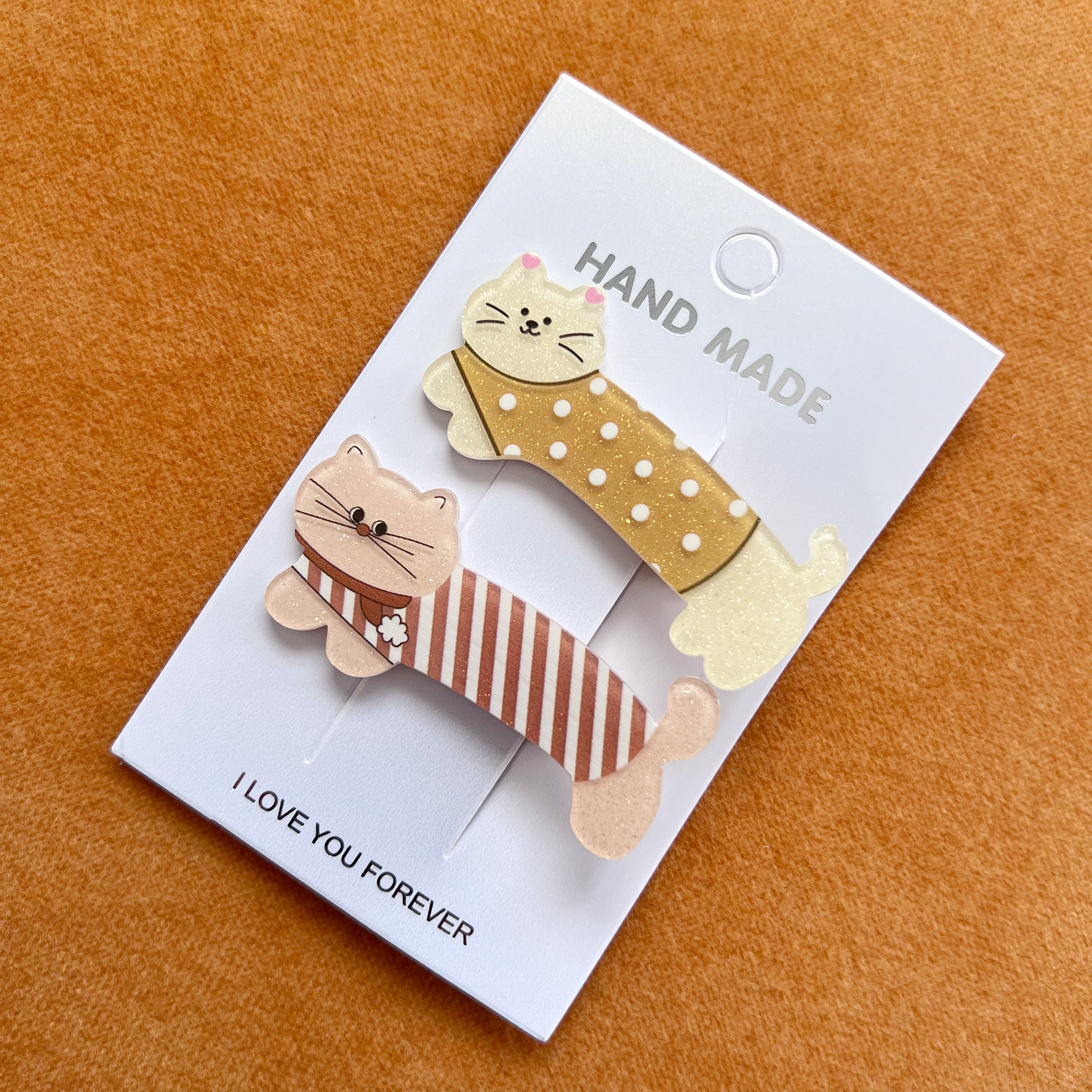 Set de 2 ganchos para cabello con diseño de mascotas