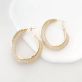 Argollas maximalista con textura