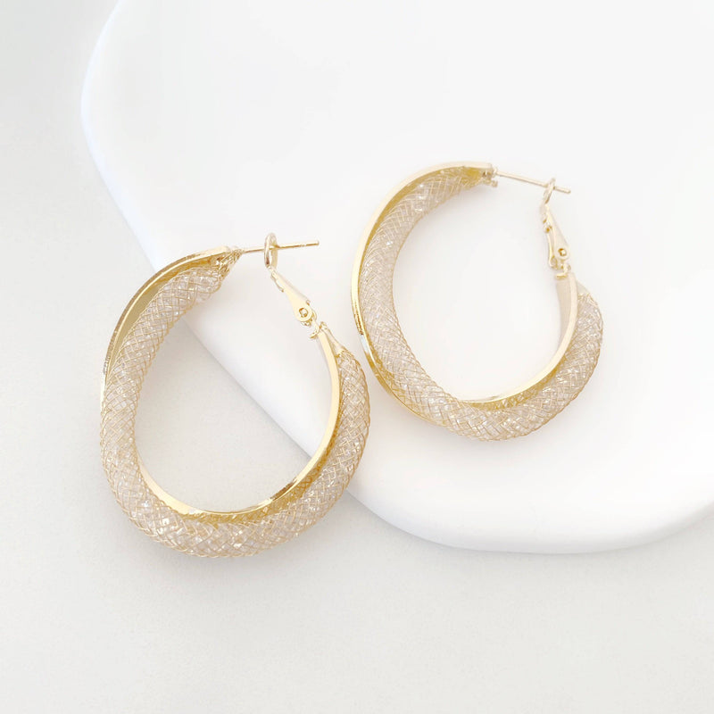 Argollas maximalista con textura