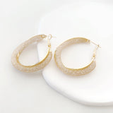 Argollas maximalista con textura