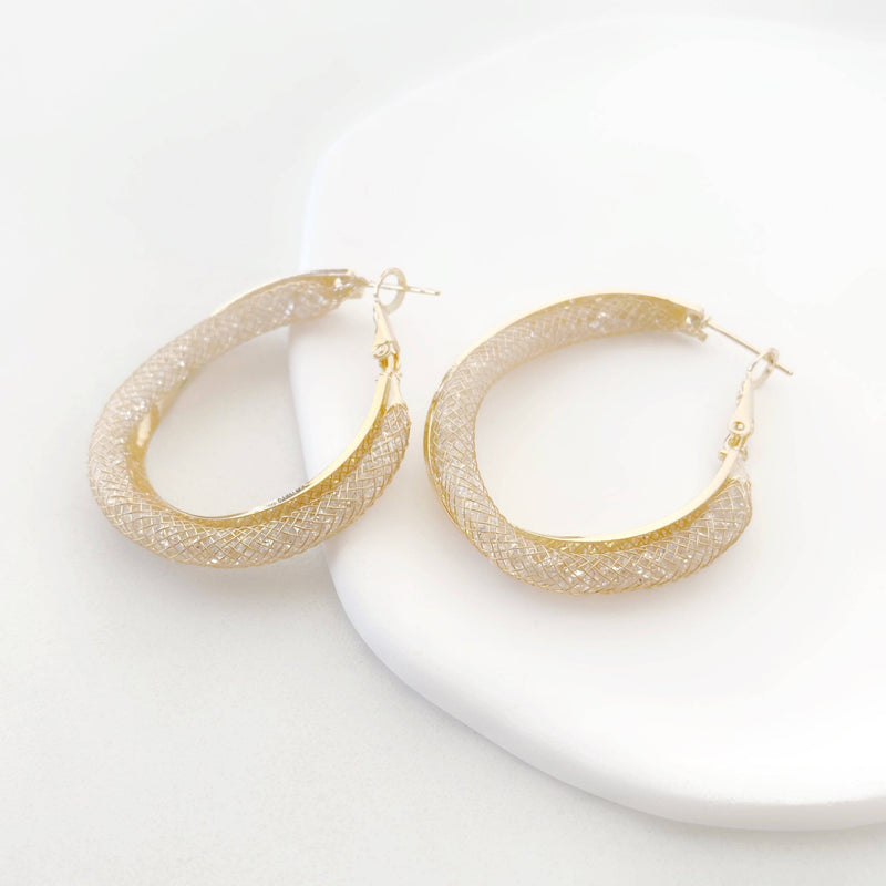 Argollas maximalista con textura