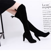 Botas altas con tacón