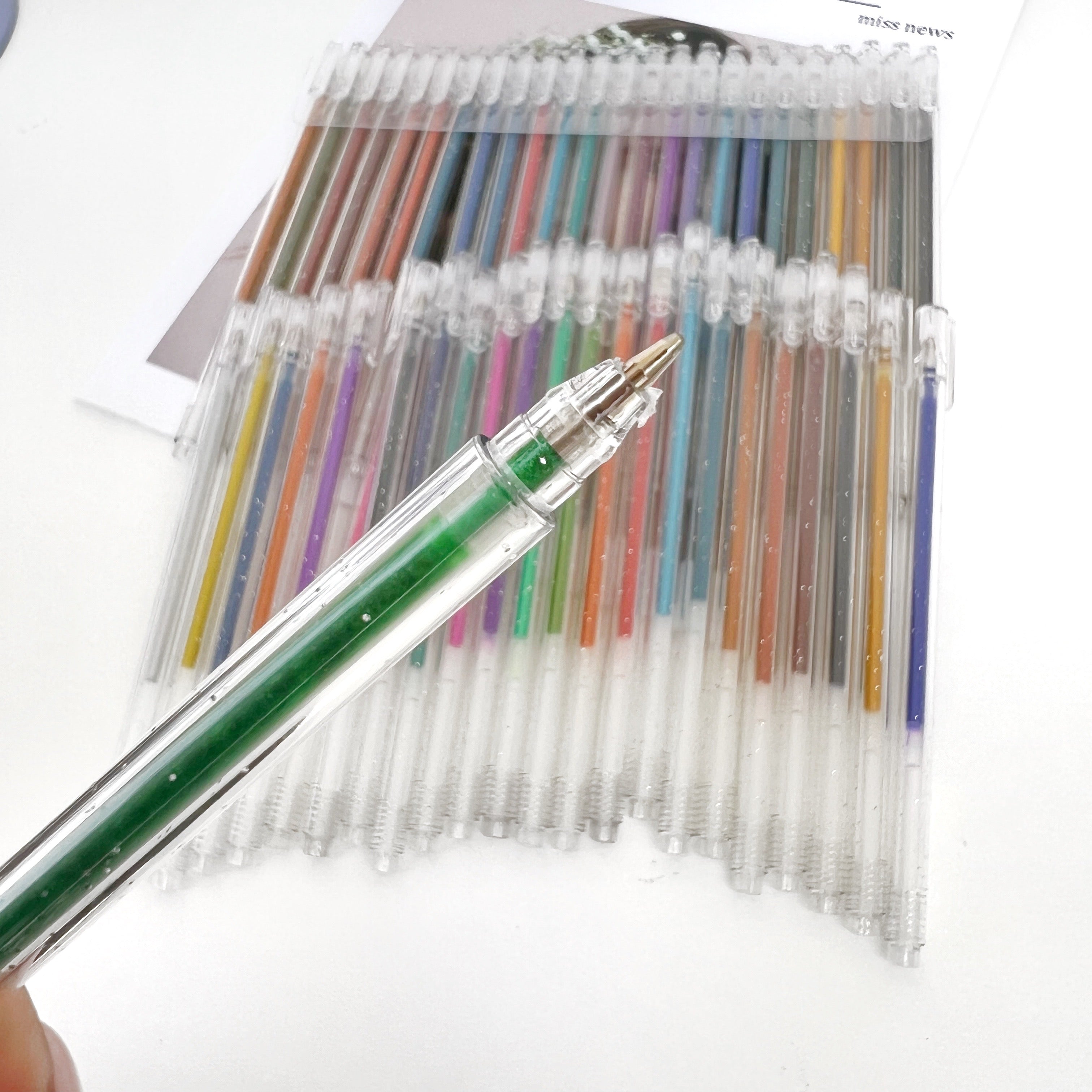 Set de 48 lapiceros con glitter