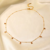Choker dorado con perlas rosas - Dressygt