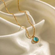 Collar con dije celeste - Dressygt