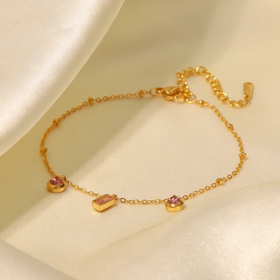 Pulsera dorada con dijes rosas - Dressygt