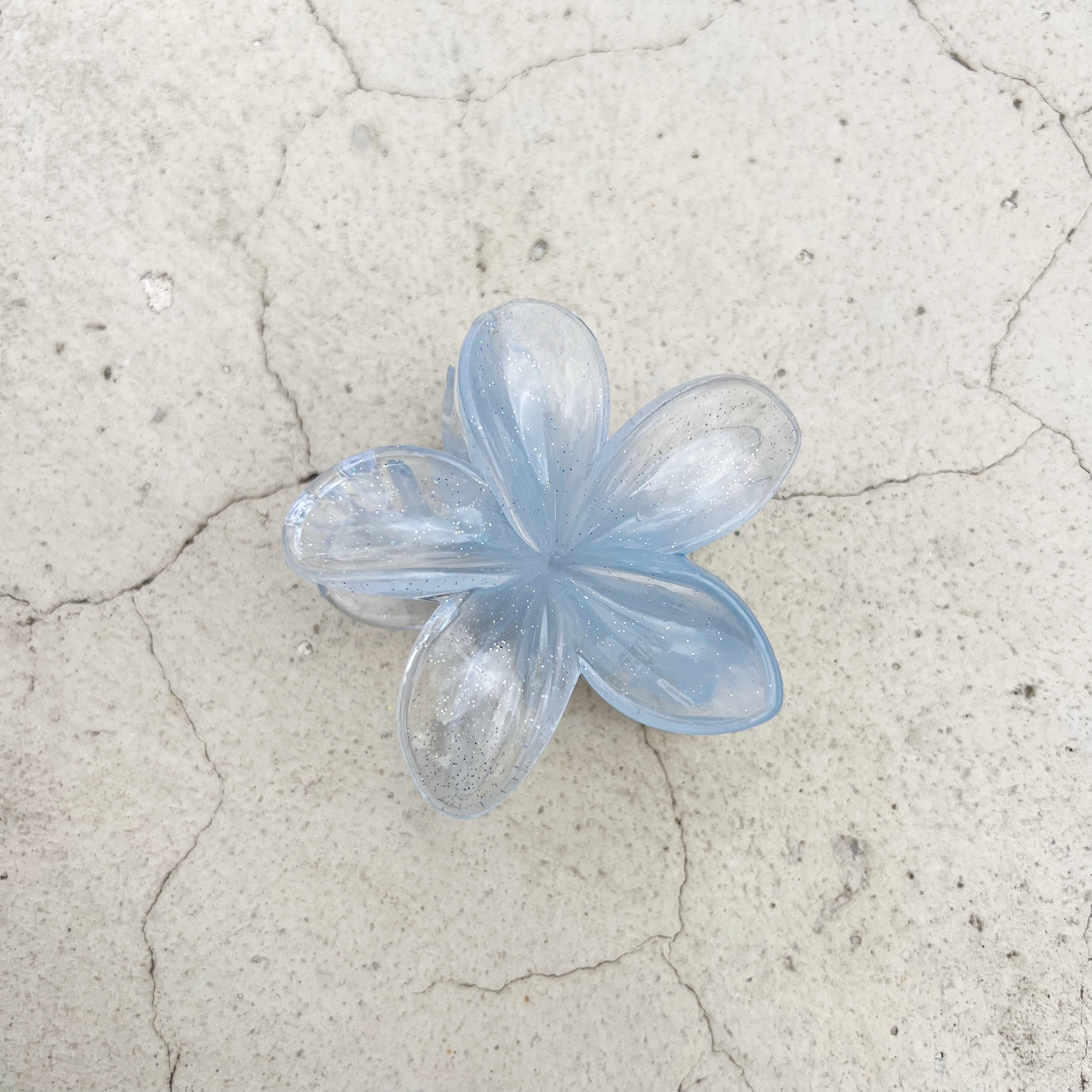 Gancho de flor con glitter para el cabello