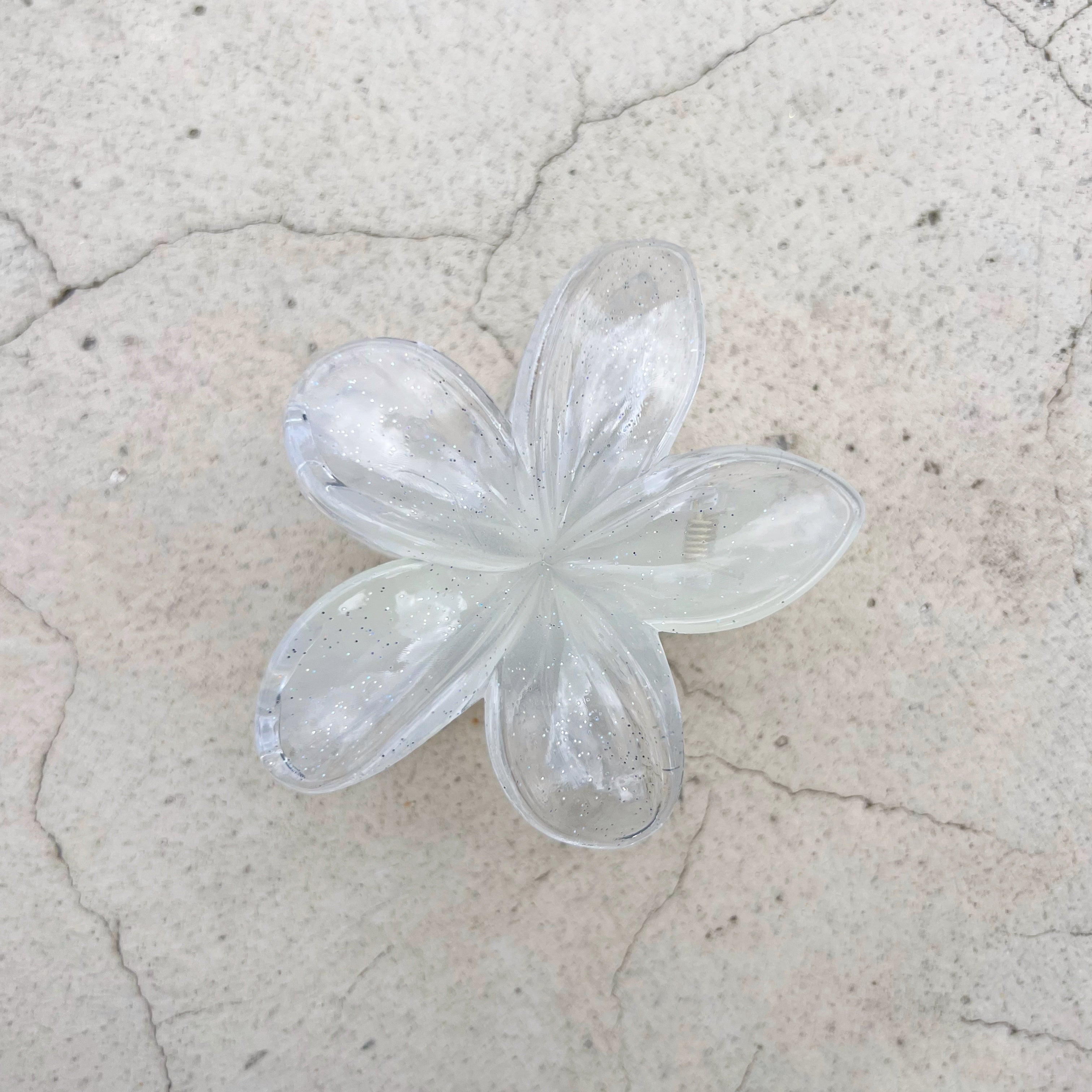 Gancho de flor con glitter para el cabello