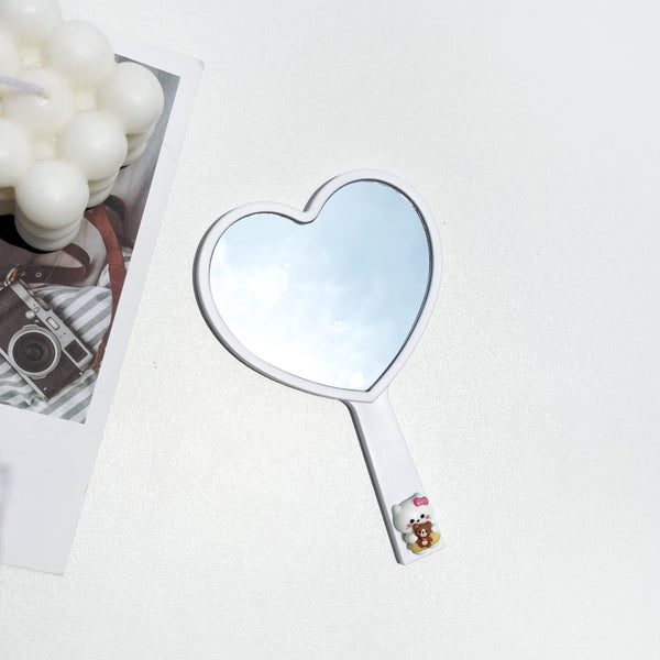 Espejo de mano con diseño de corazón