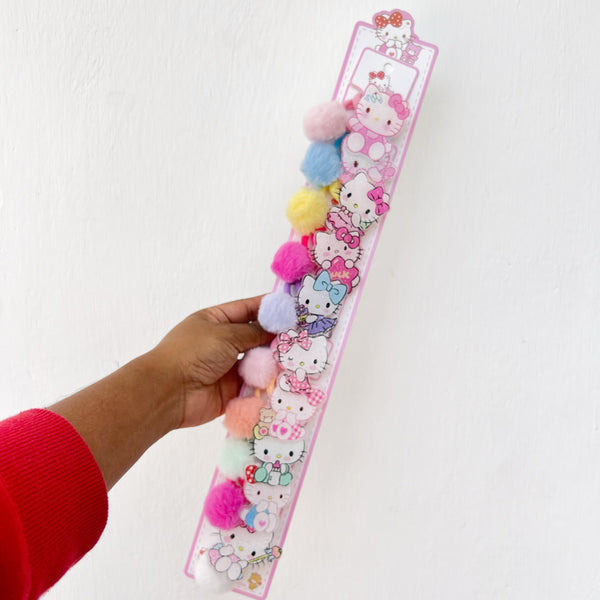 Set de colas de figuras de hello kitty, capibara y stitch