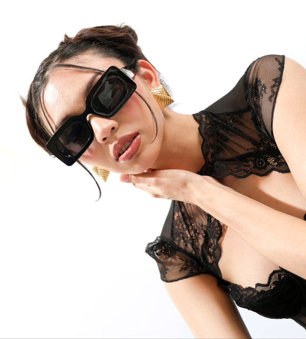 Gafas de sol con montura gruesa
