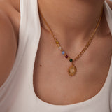 Collar de acero inoxidable con dije de sol