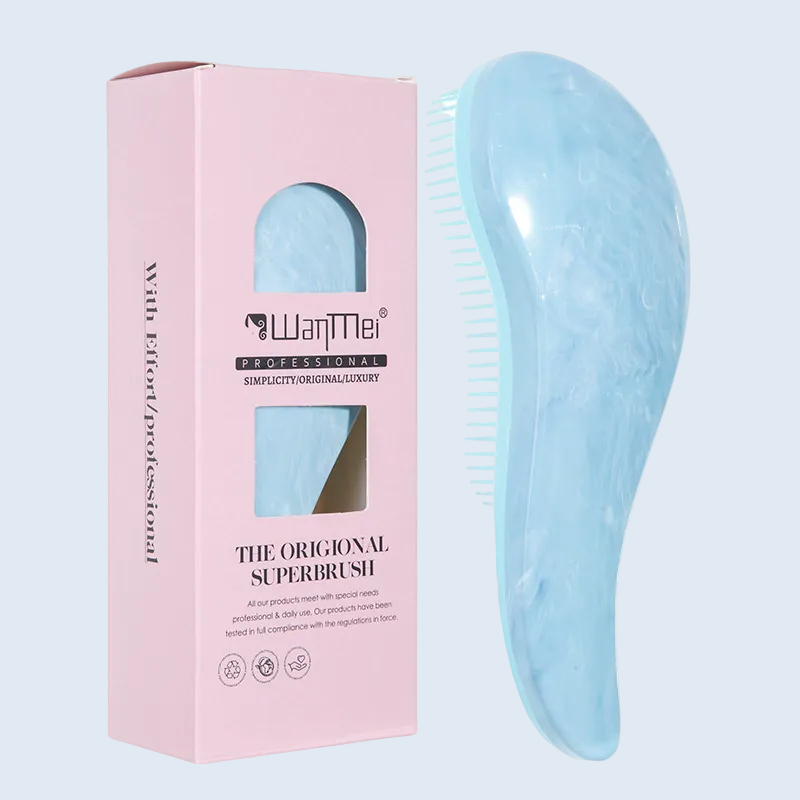 Cepillo desenredante ergonómico