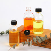 Set de mini botellas de vidrio con tapa