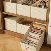 Caja organizadora de ropa con compartimentos