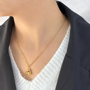 Collar dorado con dije de corazòn