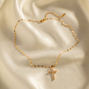 Collar con dije de cruz