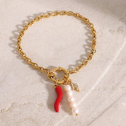 Pulsera dorada con dije - Dressygt