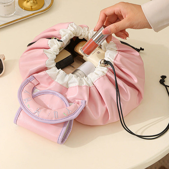 Cosmetiquera plegable con cierre ajustable