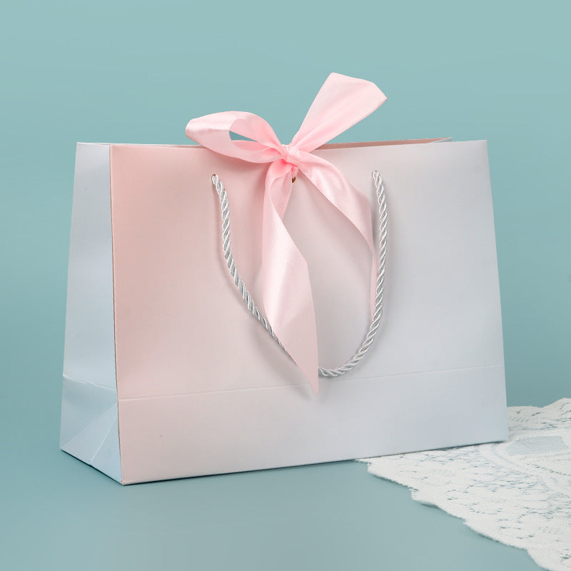 Bolsa de regalo elegante con listón
