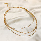 Collar triple de acero inoxidable