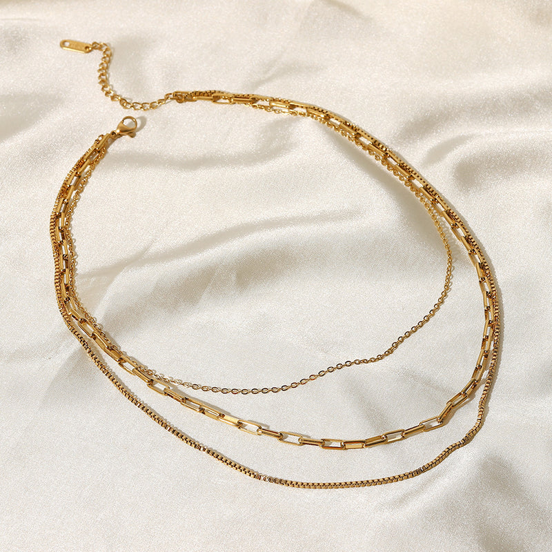 Collar triple de acero inoxidable
