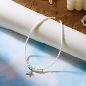 Collar con perlas y estrella de mar