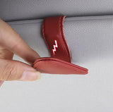 Clip para colgar gafas de sol