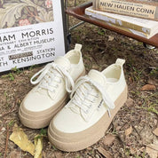 Sneakers de tela con plataforma