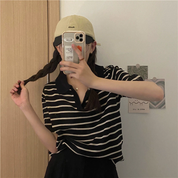 Blusa estilo polo con lineas