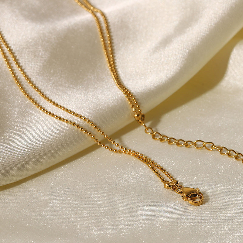 Collar dorado doble