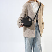 Bolso circular de fieltro