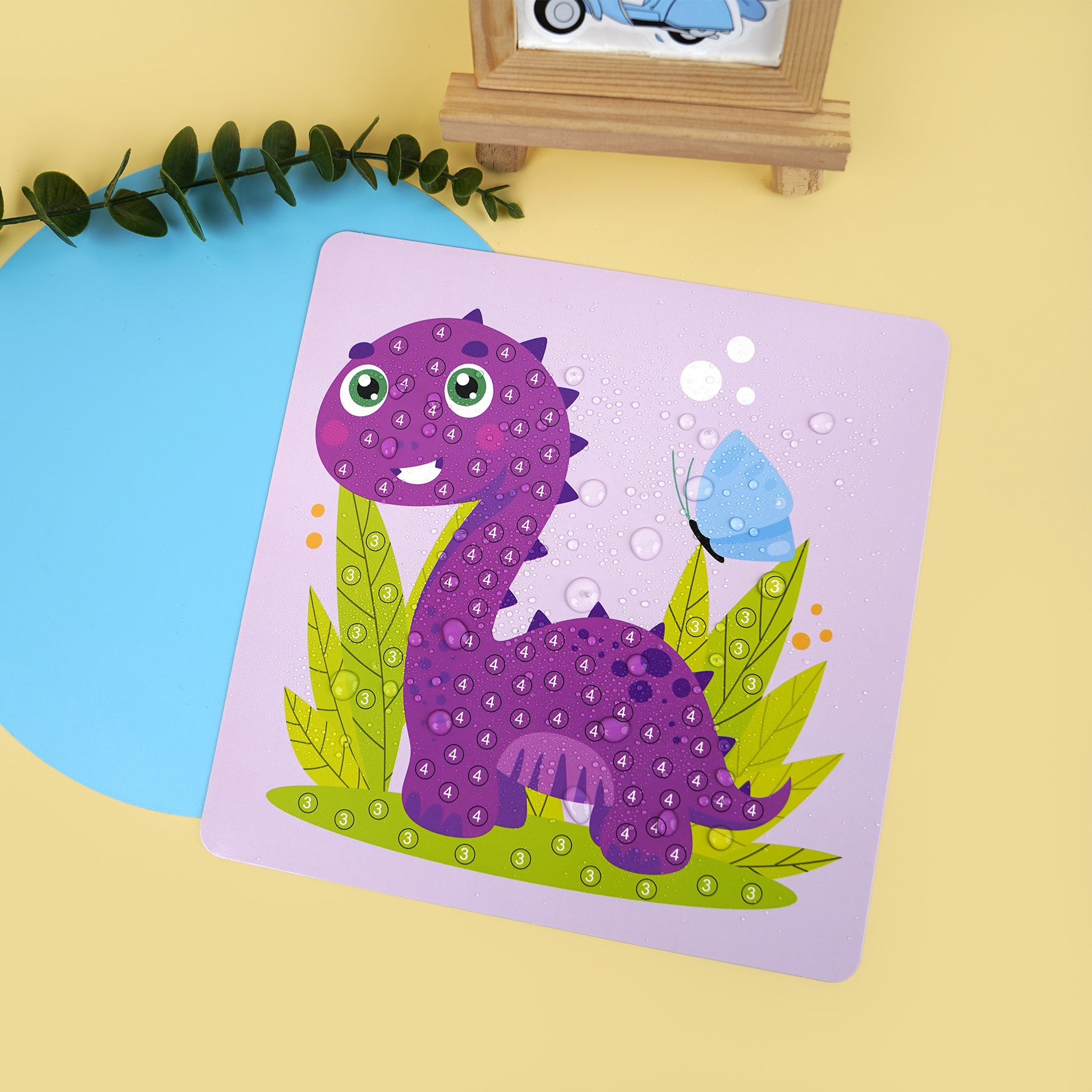 Mosaico con diseño de dinosaurios