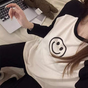Pijama de 2 piezas de manga larga con carita feliz
