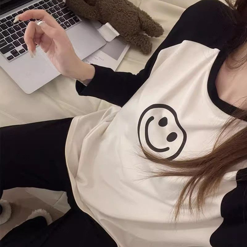 Pijama de 2 piezas de manga larga con carita feliz