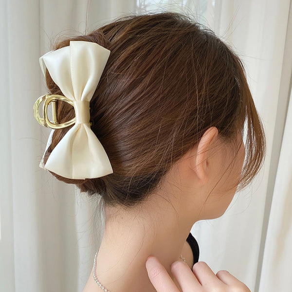 Gancho para cabello con diseño de moño