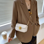 Mini bolso con cadena dorada