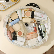 Cosmetiquera plegable con cierre ajustable